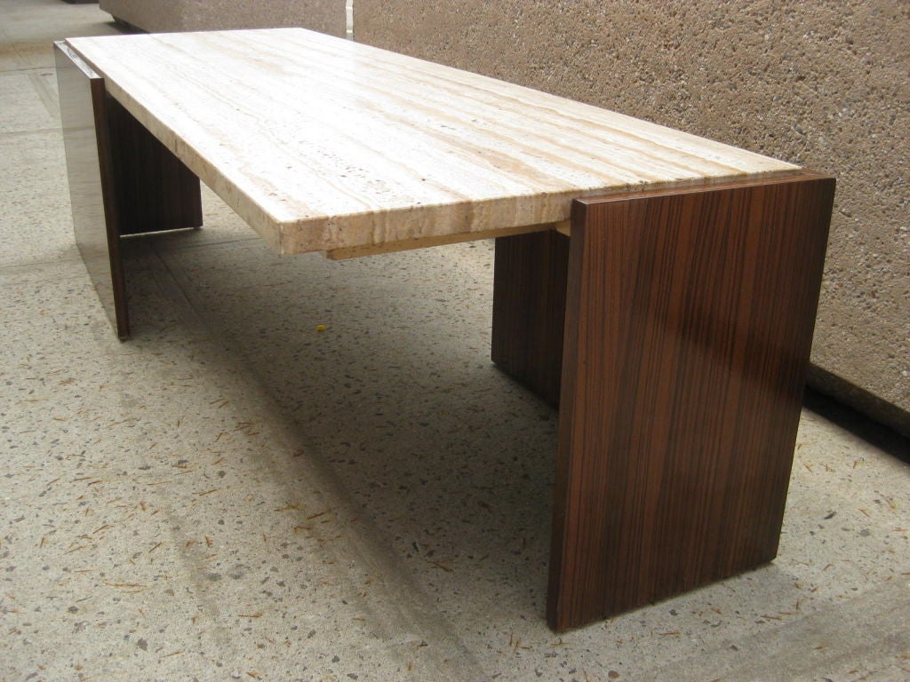 Zebra wood cantilever cocktail table after George Nelson, this Mid-Century Modern coffee table has a spectacular travertine marble top.