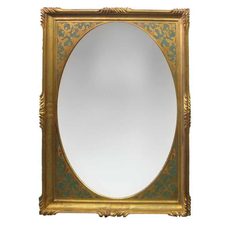 Monumental gilded hand-carved wood mirror, Hollywood Regency design with large oval beveled glass and dual, repeating relief edges, signed, a second mirror as seen in the thumbnail image measures 38X50
