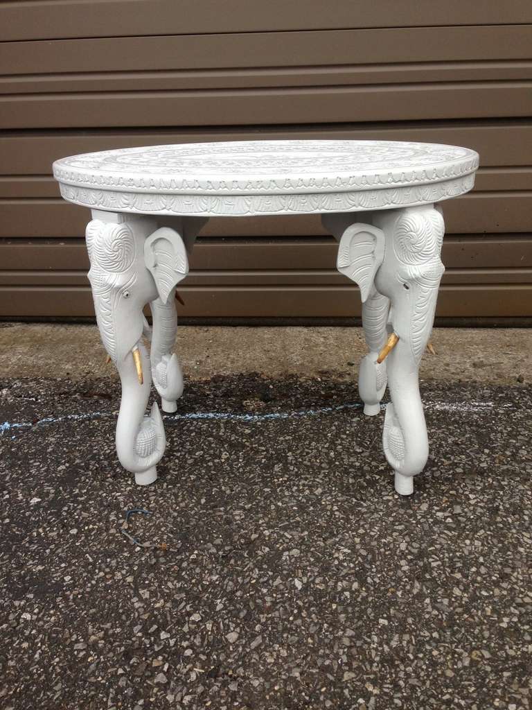 Outstanding pair of tables with elephant motif.