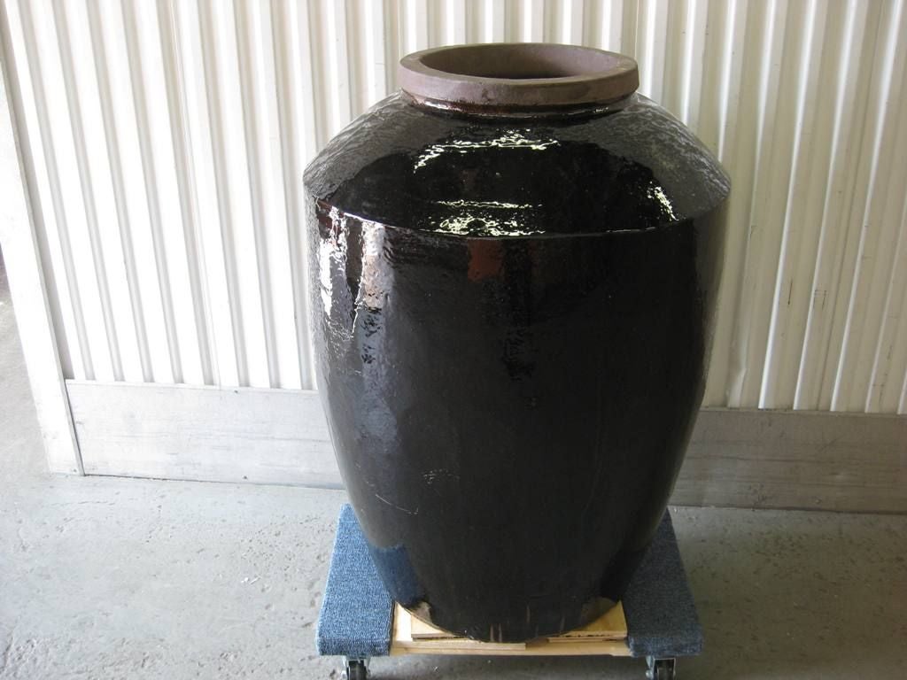 Giant size, signed monumental, Asian glazed huge metal vase, we provide rentals for stylists, photo shoot and props for movie sets, this item is on sale for a clearance price.