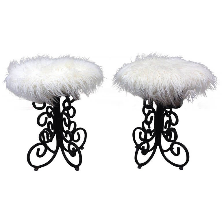 Pair of long hair decorative wrought iron ottomans.