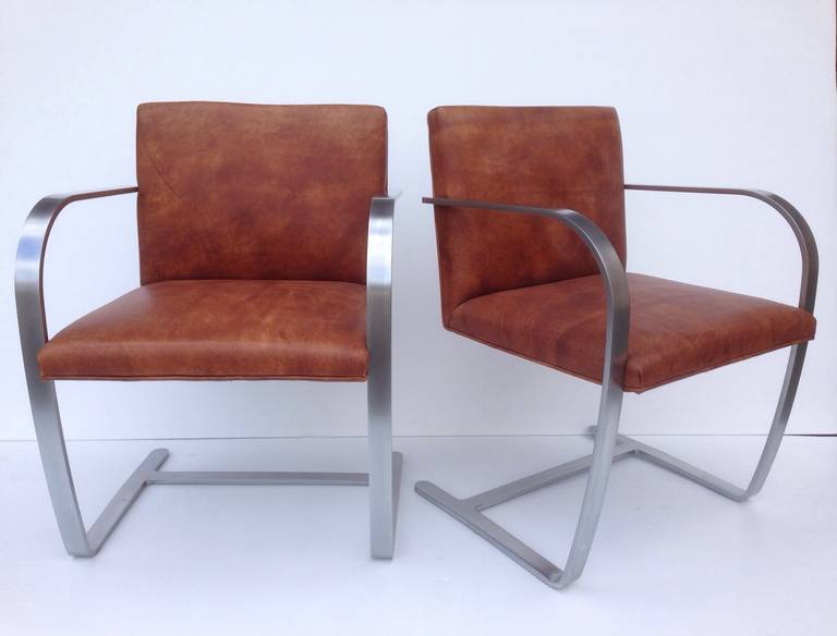 Pair of Bruno flat bar armchairs by Ludwig Mies van der Rohe, 1980s
Knoll, also available a set of ten armchairs in black leather, this item is o sale for a clearance price.
