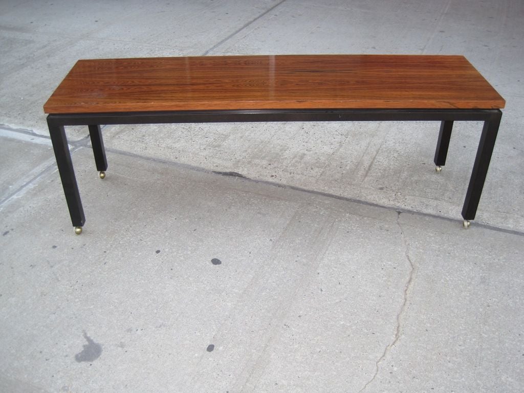 Parsons design rolling bench sofa or cocktail table attributed to Harvey Probber.
