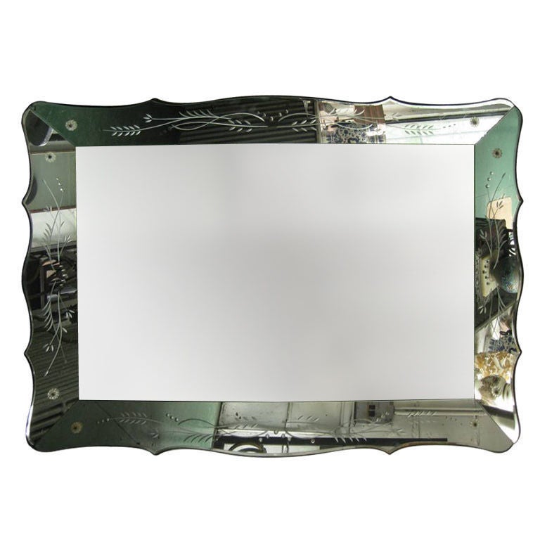 Large scalloped edge reverse etched shadow box mirror. This  item is on sale for a clearance price.