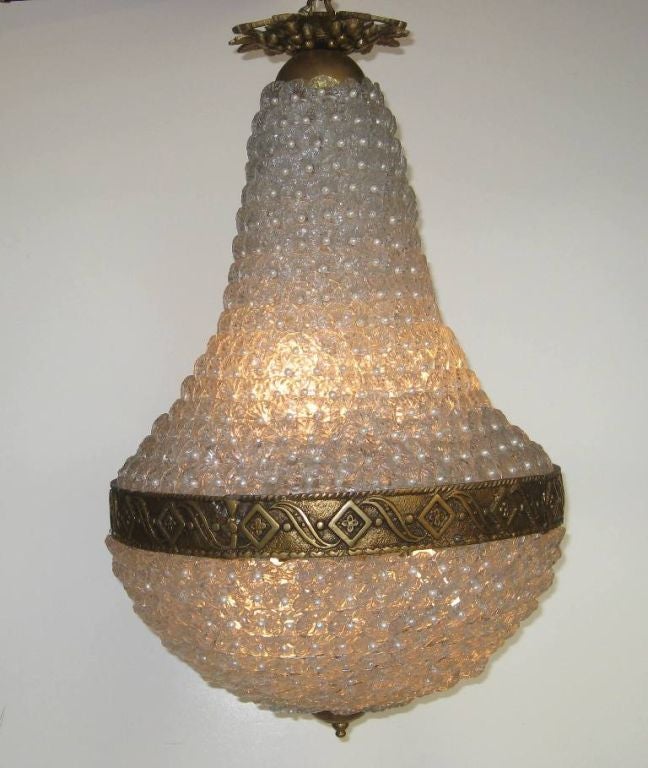 Tear drop floret chandelier with decorative ivory pearl beads.