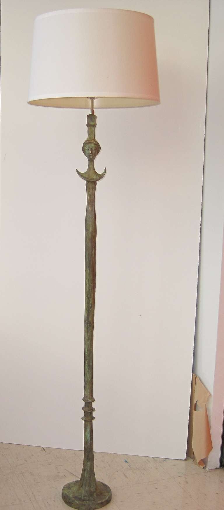 Bronze floor lamp after Giacometti, for Jean Michel Frank, priced and available individually.
