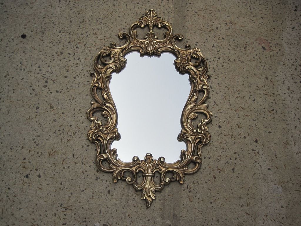 White gold mirror, medium in size with a huge presence, measurements are approximate.