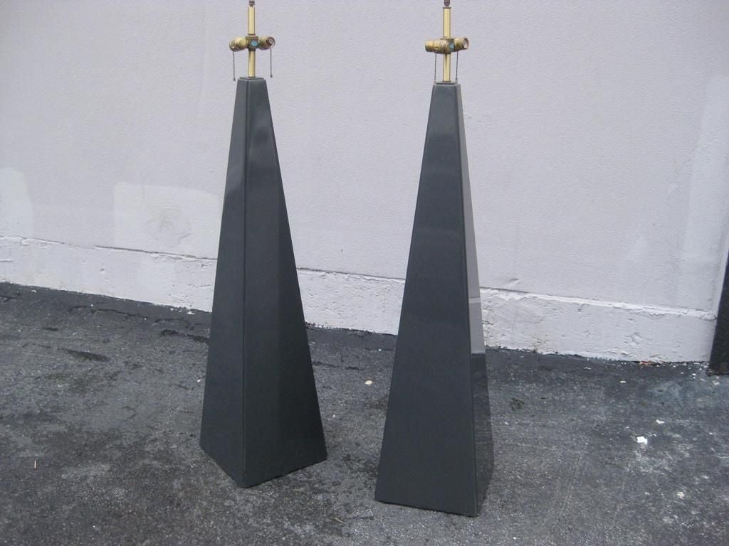 Pair of elongated pyramid floor lamps; refinish to any color all inclusive.