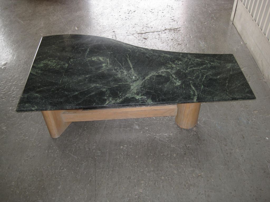 Gorgeous green black marble free-form cocktail table.