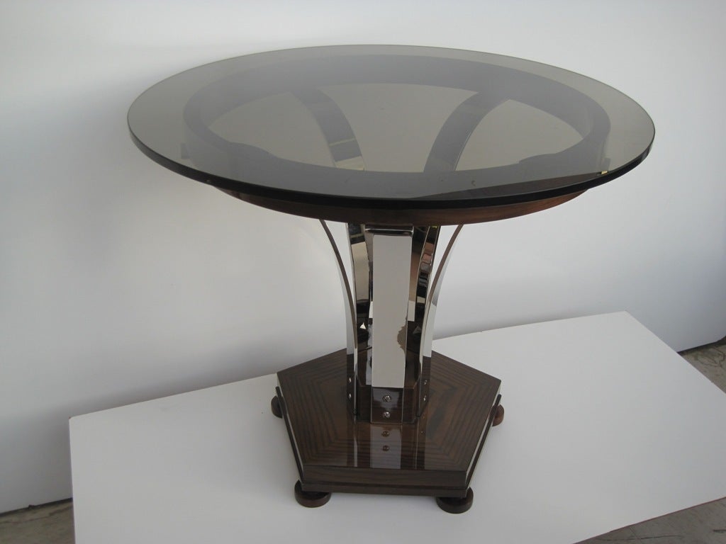 Spectacular pentagonal base gueridon by Roger Sprunger for Dunbar, a revision of the Edward Wormley Tulip table.
This table has an interesting history with three substantial changes over its life between its introduction date in 1956 to its last