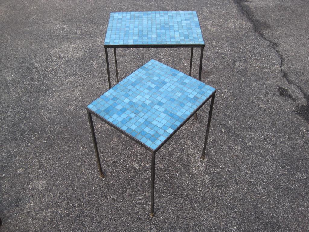Pair of tile nesting tables.