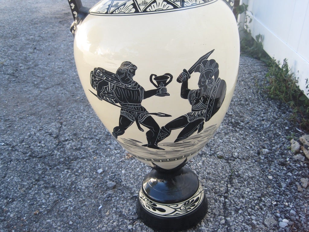 Extra large vases in the manner of Gio Poti for Richard Ginori, with neoclassical, Greek Key elements, Roman Chariots and Gladiator depictions.  This pair is now on sale for a clearance price.