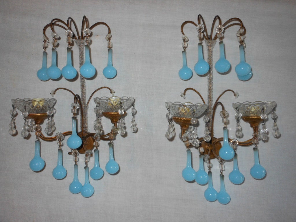 Gorgeous pair of micro beaded murano turquoise drops sconces.Very rare gilded gold wood frames picked up in the south of France!