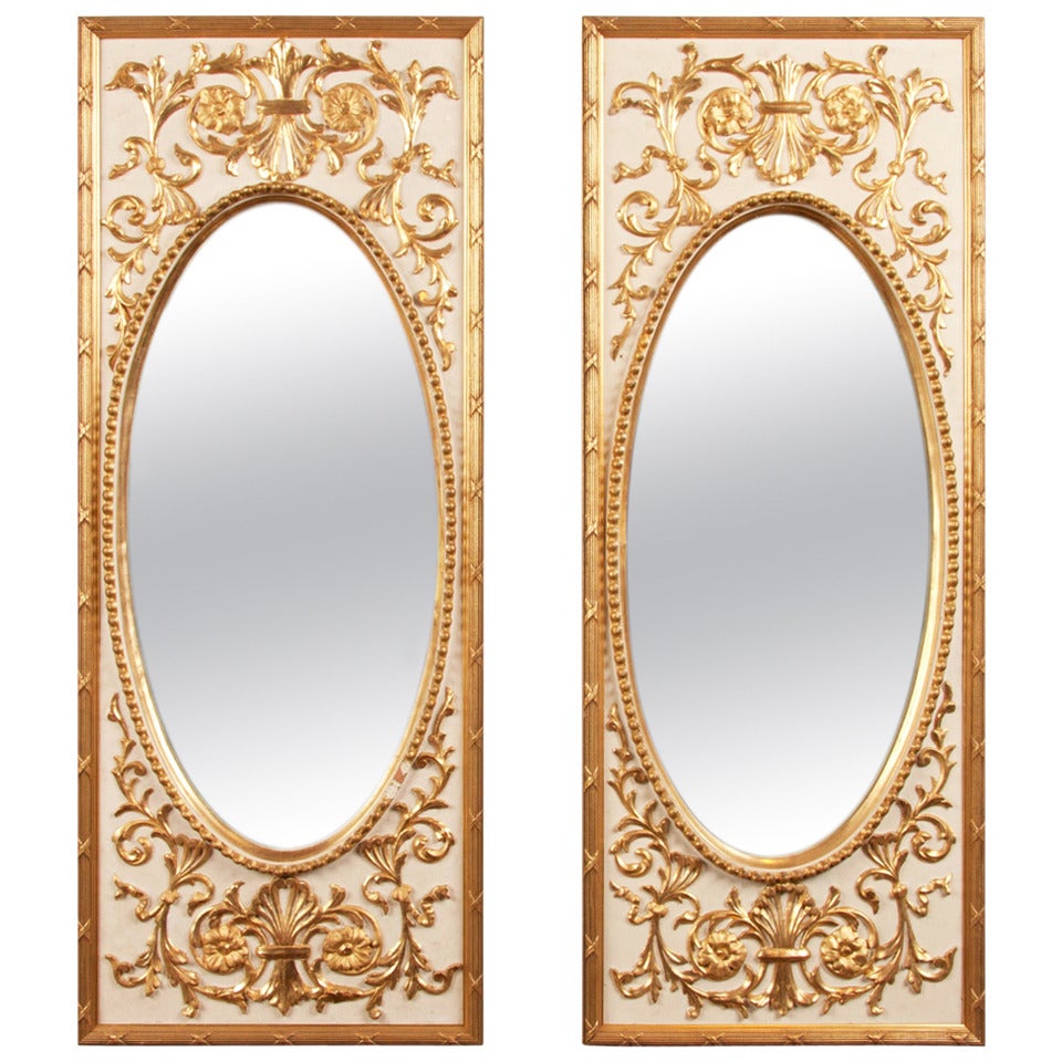 Pair of Neoclassical Parcel-Gilt Mirrors For Sale