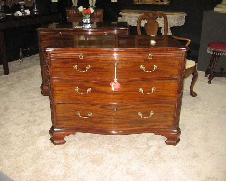 British A pair of late 18th C Serpentine commodes For Sale