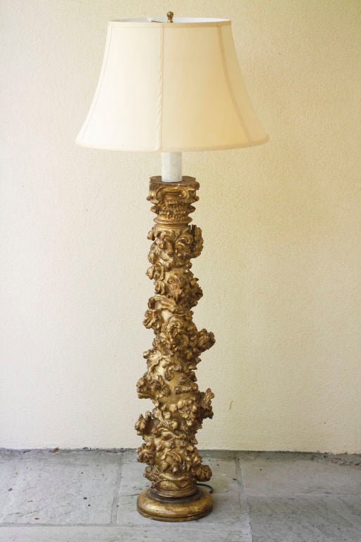 An Italian 17th century carved gilt column; now as a lamp.