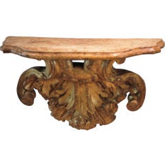 A Gilt Carved Console