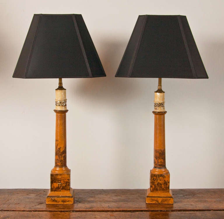 A pair of early 19th century Regency period toleware and decoupage lamps.
Shades: 14" x 14".