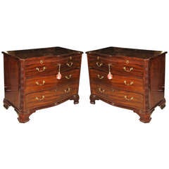 A pair of late 18th C Serpentine commodes