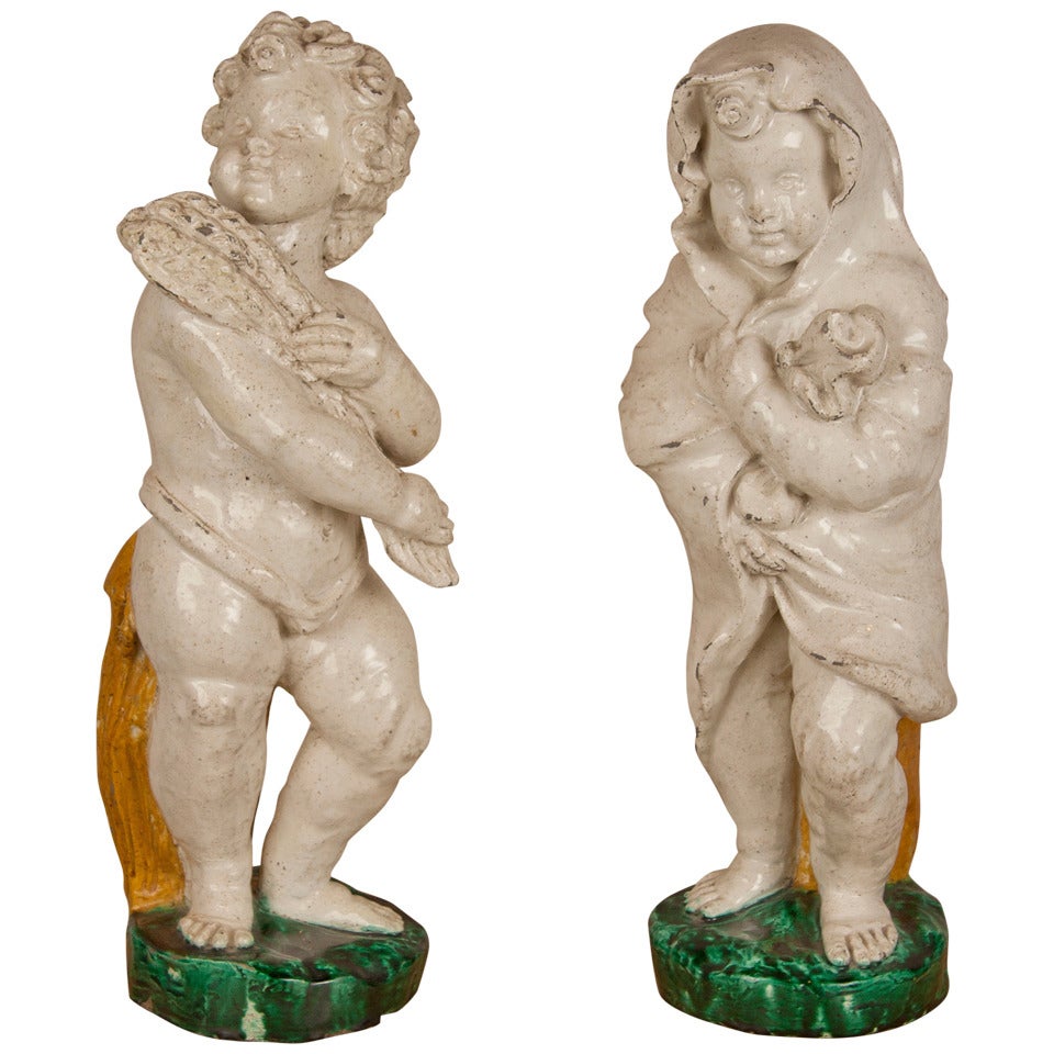 Pair of Majolica Putti For Sale