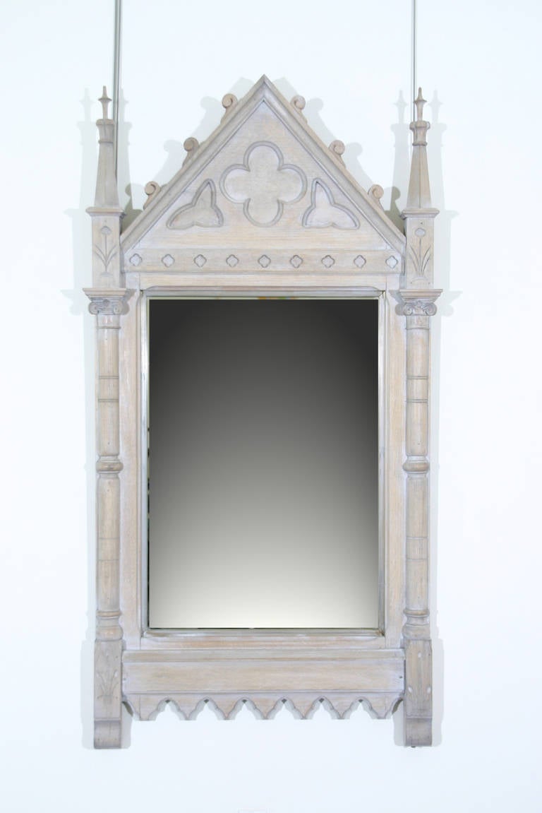 An Arts and Crafts Period Late 19th Century Limed Oak Gothic Mirror