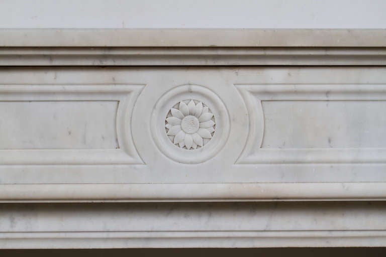 Louis XVI style white Carrara marble mantel. 

Interior dimensions H: 32