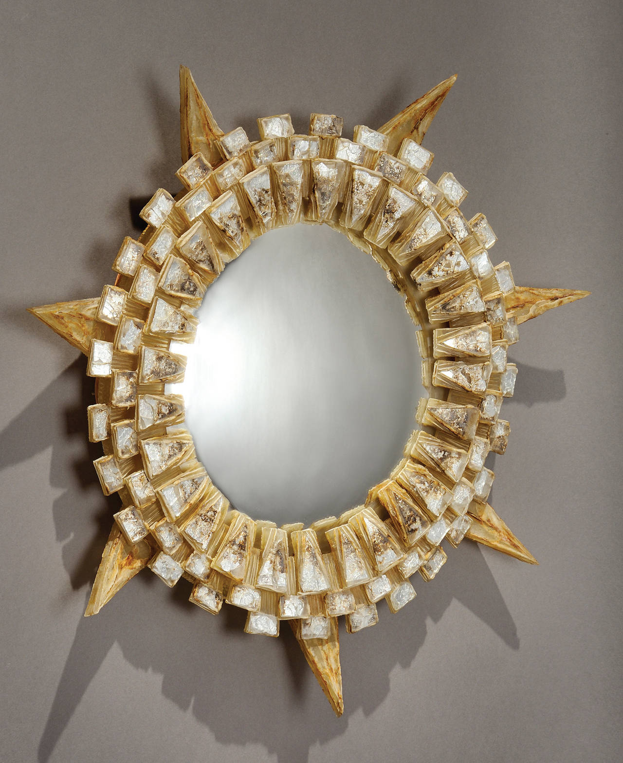1955.
Description: Unique and exceptional talosel and resin convex mirror by Line Vautrin. Talosel is a resin material invented by Vautrin. It is derived from cellulose acetate and the name is shortened form of 'acetate de cellulose elabore,'