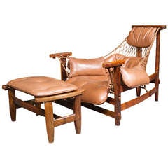 Leather Armchair and Ottoman by Jean Gillon