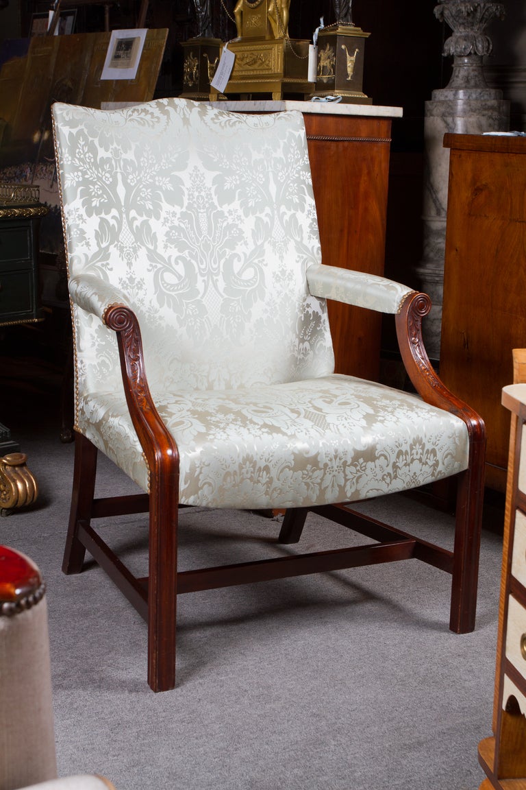 George III style mahogany Gainsborough chair, upholstered in celadon colored, silk damask.