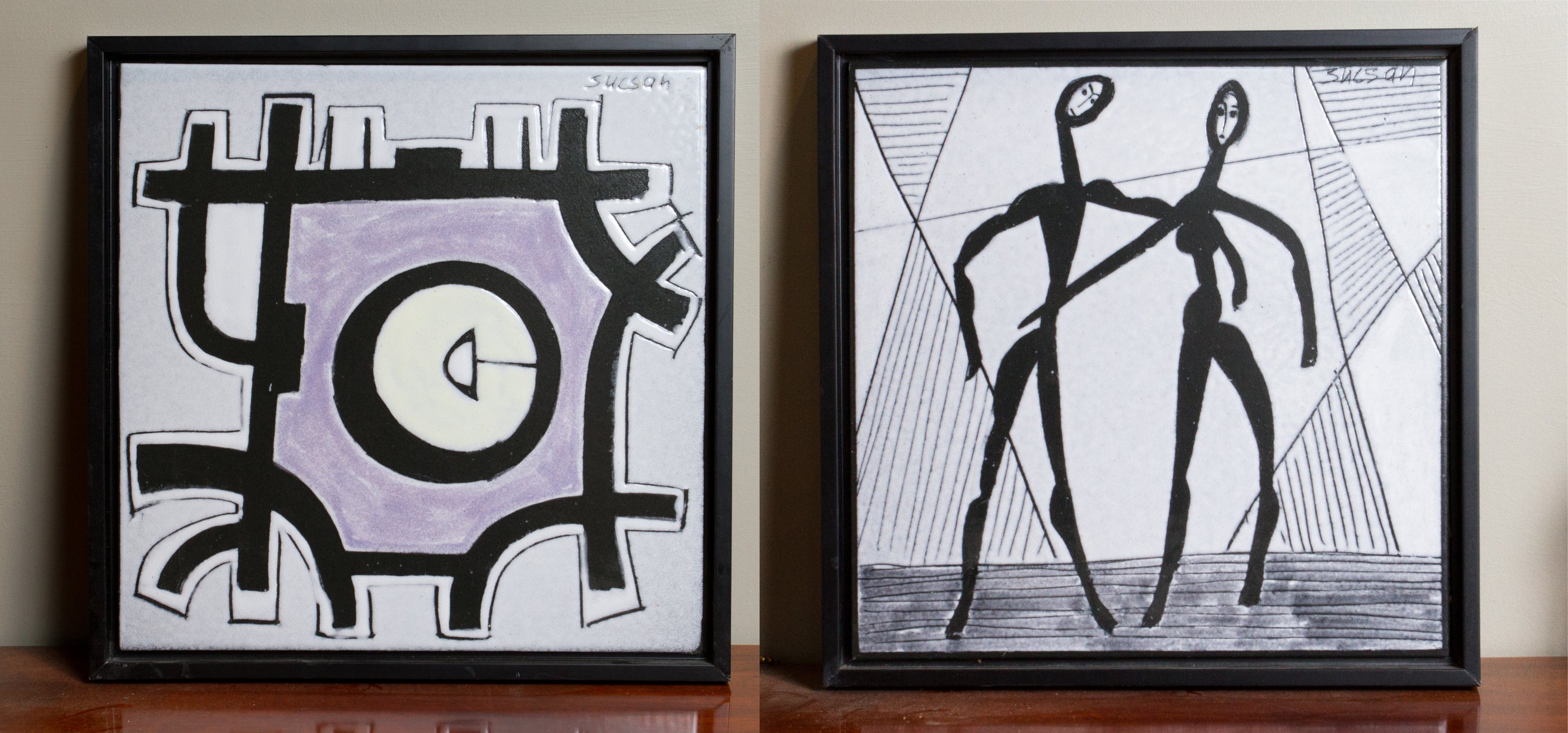 Pair Of Ceramic Plaques by Charles Sucsan