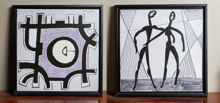Pair of abstract, enamelled, ceramic plaques by Charles Sucsan. Signed 