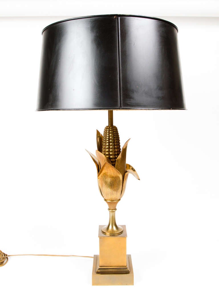 Beautiful quality gilt bronze lamp by Maison Charles in the form of a corn  on a square base, together with a black tole shade.