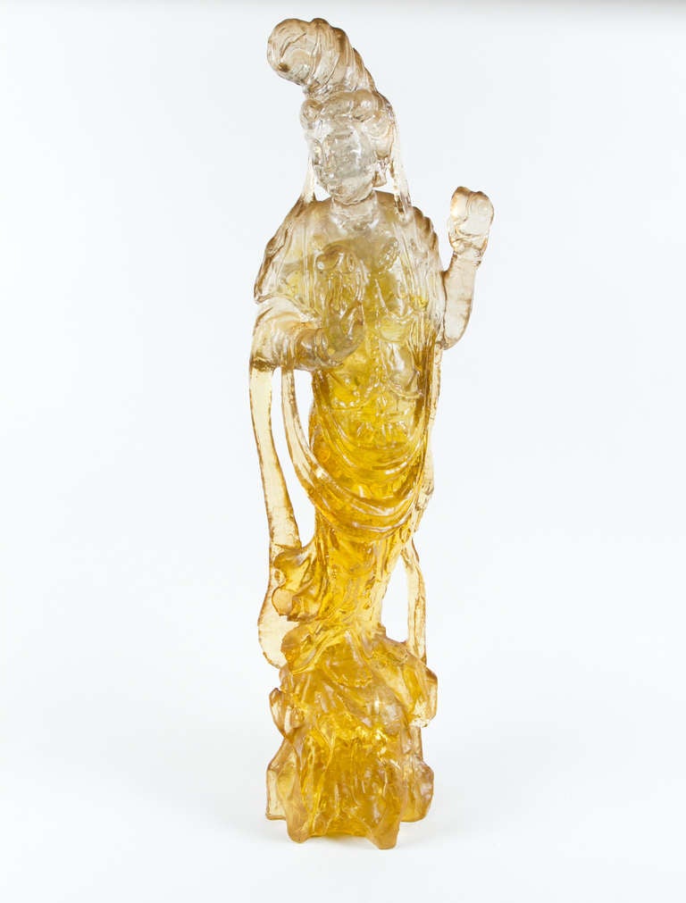 Interesting clear and yellow resine sculpture representing a Chinese Goddess.