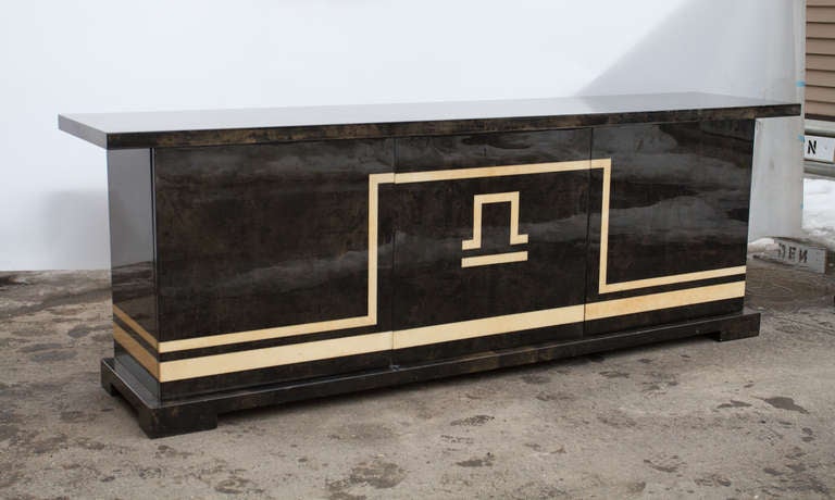 Rare and fine charcoal and ivory color, three-door credenza / buffet by Aldo Tura.