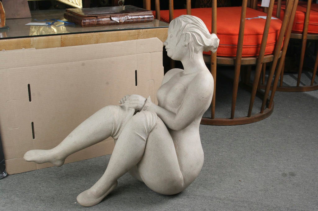 Sculpture of a woman dressing. Property from the collection of Muriel Karasik.