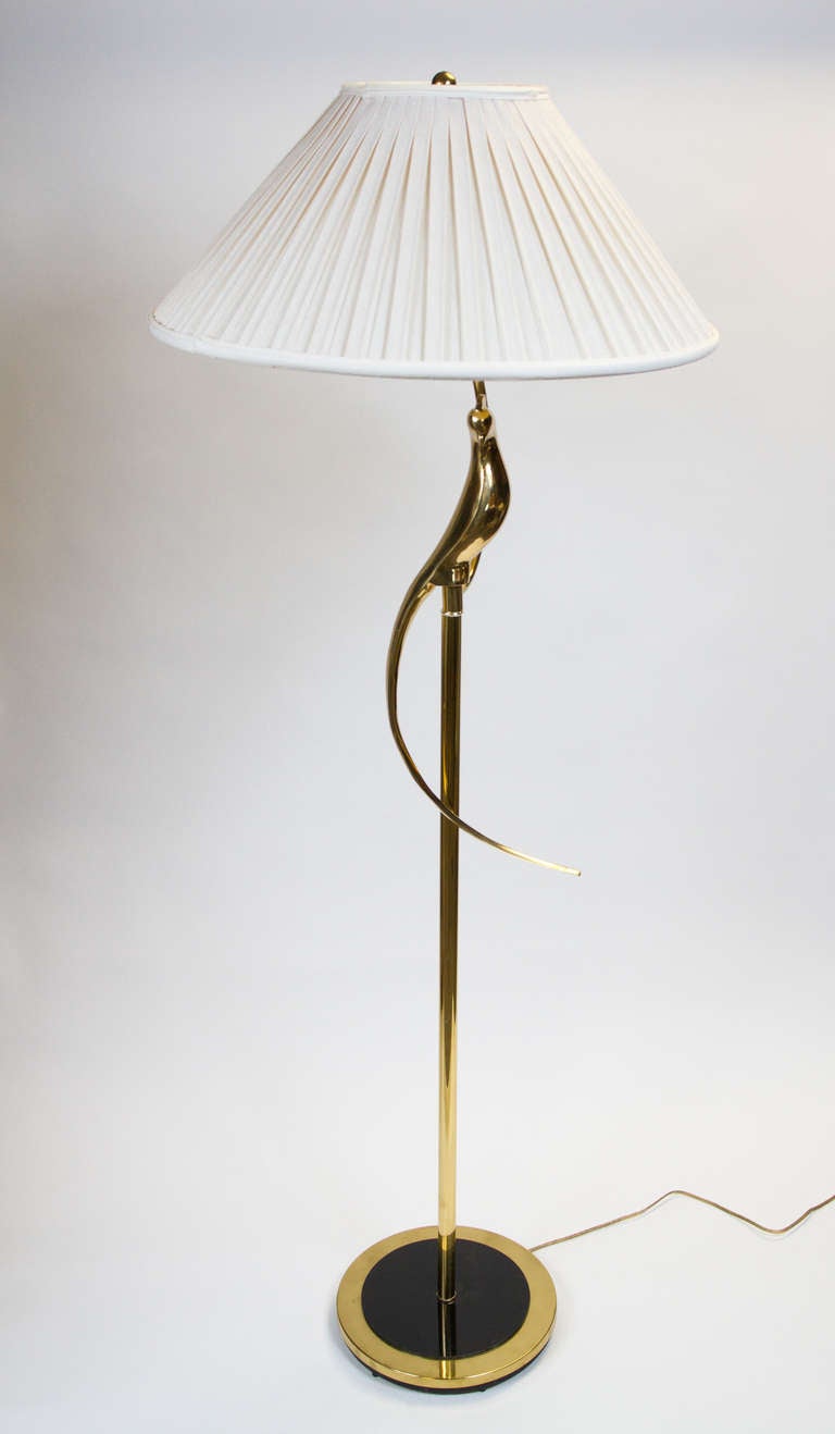 Polished brass parrot-form sculptural lamp.