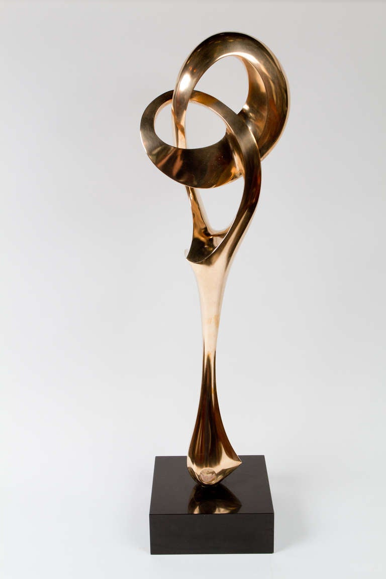 Abstract mid-century polished brass sculpture by Antonio Kieff (b. 1936). Signed 