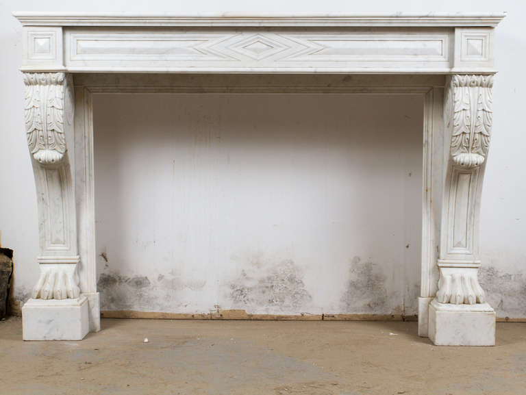 White Empire style Carrara marble mantel. 

Interior dimensions: W 41