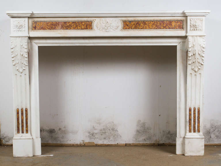 White statuary and Spanish Brocatelle marble mantel

Interior dimensions: 
W: 40.5