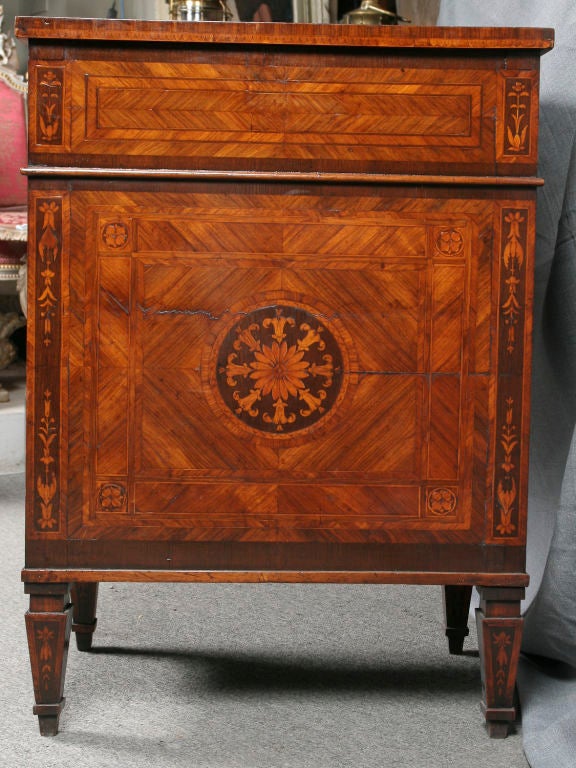 Very rare 18th century Italian neoclassical desk attributed to the workshop of Giuseppe Maggiolini. The piece is composed of extensive inlay and marquetry of multiple rare woods over a walnut sub-structure.