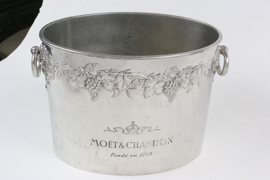 Oval pewter champagne buckets made for Moet Chandon. Hold two champagne bottles.
