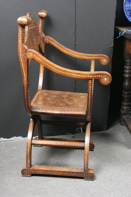 Walnut bone inlaid savonarola chair.