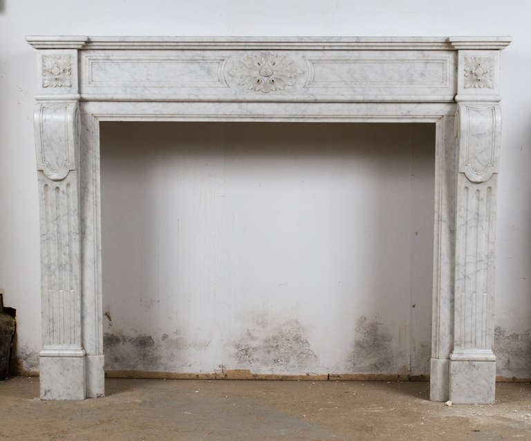 White Carrara marble Louis XVI style marble mantel.

Interior dimensions: W: 40