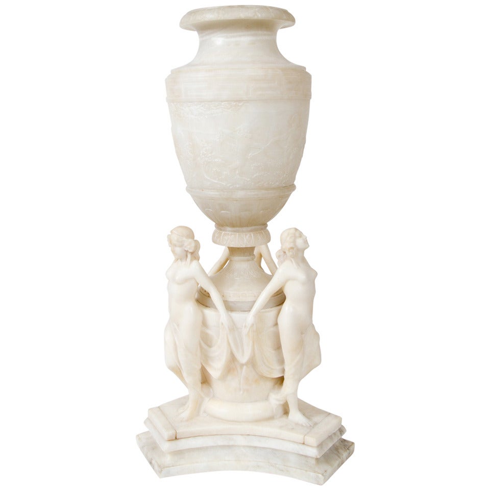 Carved white alabaster urn