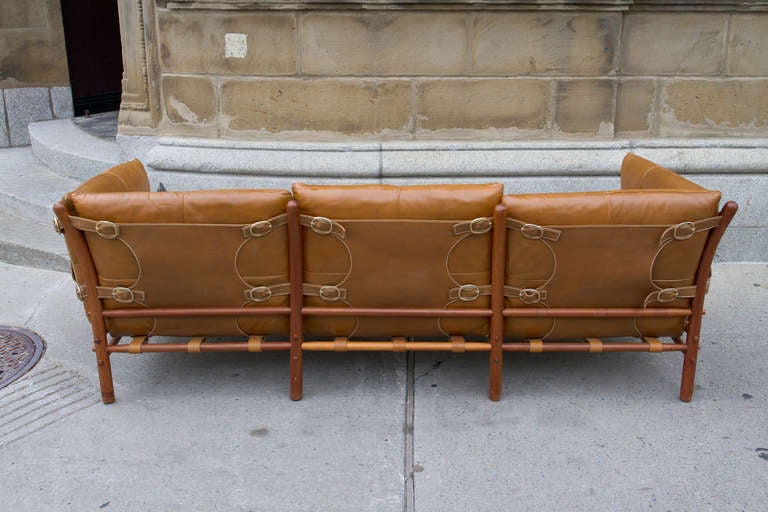 Teak leather upholstered 