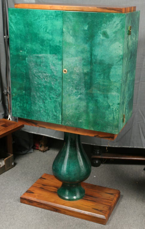 Rare and unusual Brazilian rosewood and emerald green stained goat skin bar cabinet with mirrored fitted interior by Aldo Tura.