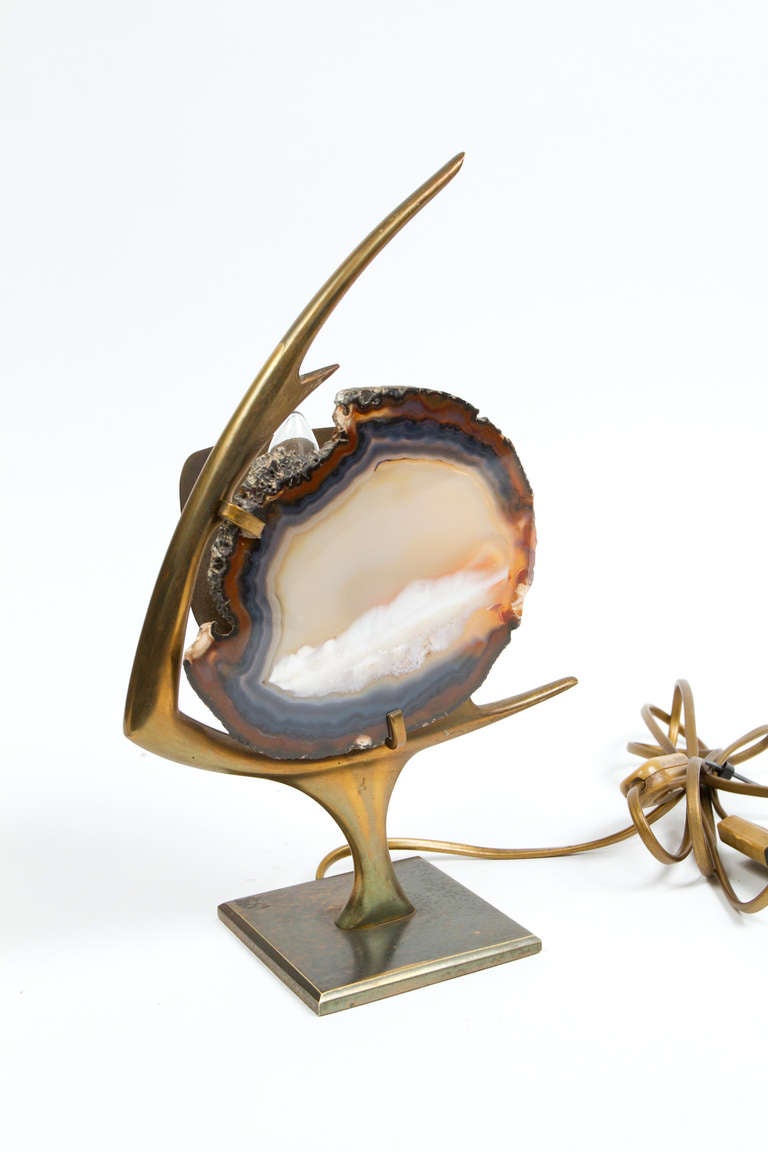 Unusual brass and agate inset lamp sculpture in the form of a fish.