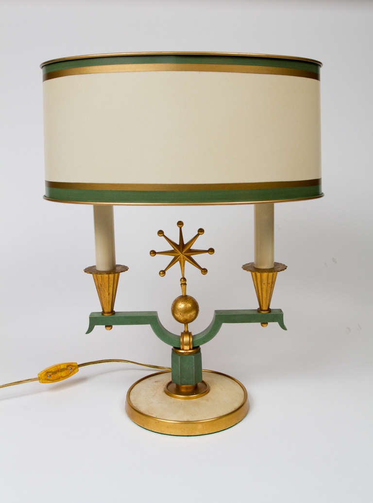 Fine Art Deco gilt and patinated bronze lamp by Genet et Michon. Signed on the parchment inset base: “Genet Michon.”