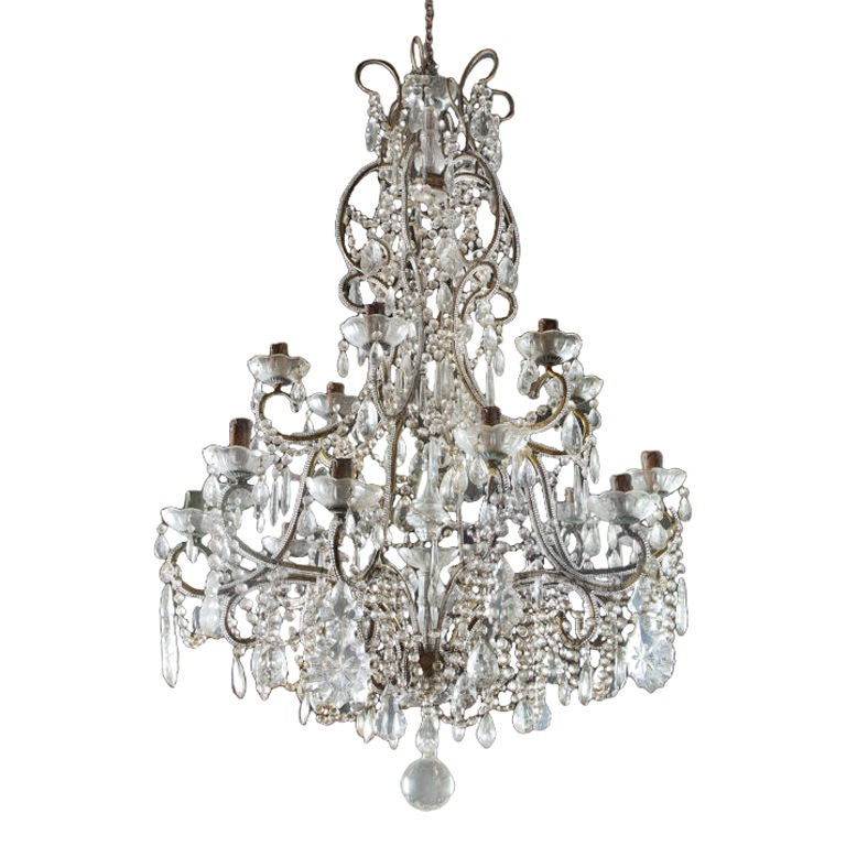 Large cut glass and gilt metal 18 light chandelier.