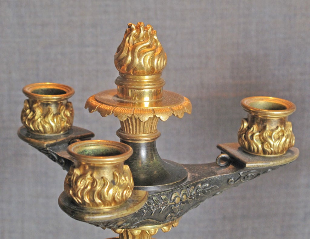 Paire de candélabres en bronze doré d'époque Charles X